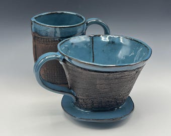 Hand-built pour-over coffee maker with leather-like surface and light blue glaze