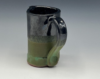 Hand-built espresso mug with a handle