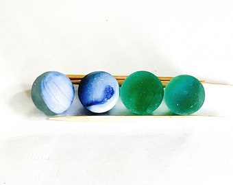 Genuine rare sea glass marbles from Puerto Rico. 2 blue and 2 green marbles