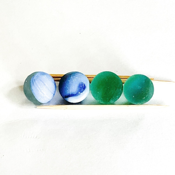 Genuine rare sea glass marbles from Puerto Rico. 2 blue and 2 green marbles