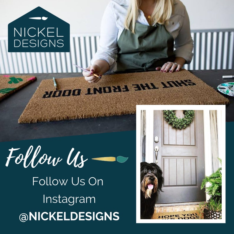 May include: A brown coir doormat with the text "Shut the front door" in black lettering. The doormat is being painted by a person. A second doormat with the text "Hope you like dogs" is visible in the background.