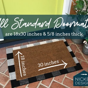 May include: A brown coir doormat with a black and white checkered border. The doormat measures 18 inches by 30 inches. The text "All Standard Doormats are 18x30 inches & 5/8 inches thick" is displayed above the doormat.