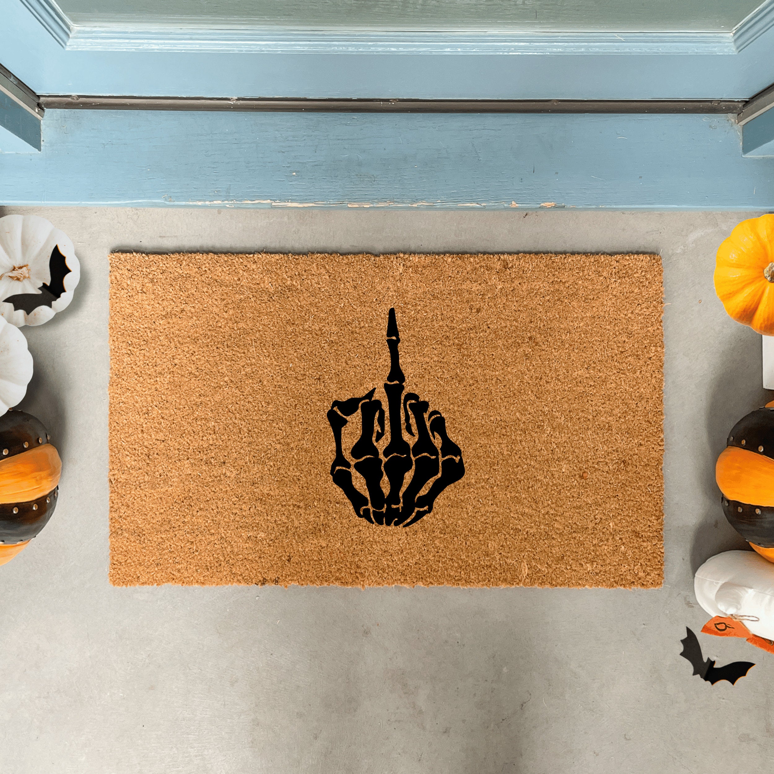 Looking for a spooky addition to your Halloween decor? This Skeleton Doormat with a rude Middle Finger design is the perfect way to greet your guests with some Halloween spirit. Handmade and available on Etsy, this Halloween doormat is sure to add a creepy touch to your outdoor decorations this season.