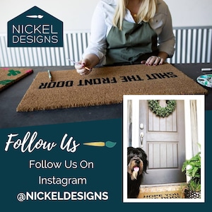 May include: A rectangular brown coir doormat with the black text SHUT THE FRONT DOOR printed on it. A smaller inset image shows a brown front door with a green wreath, a black dog, and a partial doormat with the text HOPE YOU LIKE DOGS.