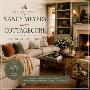 May include: A digital guide titled Silver Maple Designs Nancy Meyers meets Cottagecore Living Room Guide. The cover features a beige sofa with rust and green pillows, a wooden coffee table with books and flowers, and a fireplace in a room.