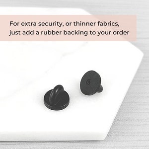 Optional rubber backing clasp shown as an extra fastening choice for pronoun pin security