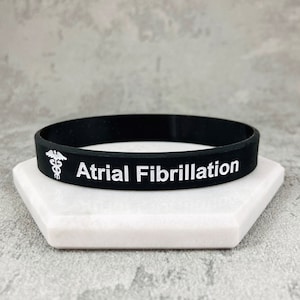 Medizinisches Armband für AFIB Herzbewusstsein Armband Unregelmäßige Herzschläge Vorhofflimmern Herren Damen Alarm Armbänder Schwarz Weiß Band UK