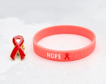 Red Awareness Ribbon Wristband – Heart Disease & Haemophilia Support