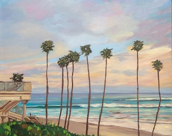 May include: An oil painting depicts a serene beach scene with tall palm trees silhouetted against a pastel sky. The artwork features a sandy beach, ocean waves, and a building on the left, with lush green foliage and pink flowers in the foreground.