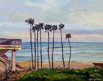 May include: A painting of a beach scene with palm trees in the foreground and a wooden pier in the background. The sky is a light blue with clouds and the ocean is a light blue with waves.