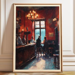 May include: An oil painting print in a light wood frame depicting a dimly lit pub interior with deep red walls, a dark wooden bar, a glowing chandelier, and several figures seated on stools near a large window with blue light filtering through.
