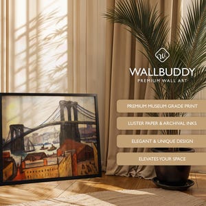 May include: A framed wall art print featuring a painting of the Brooklyn Bridge with city buildings and boats in a warm color palette. The text WALLBUDDY PREMIUM WALL ART is visible along with four rectangular labels listing product features.