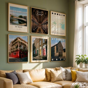 May include: A gallery wall featuring six framed prints of Dublin landmarks, including the Ha'penny Bridge, Trinity College library, a city map, The Temple Bar Pub, colourful Georgian doors, and the St. James's Gate brewery entrance in light wood frames.