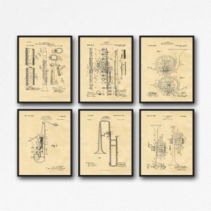 May include: Set of six vintage patent prints featuring different musical instruments, including a clarinet, flute, french horn, saxophone, trombone, and trumpet. Each print features a black and white illustration of the instrument and the patent information, including the patent number, inventor's name, and date.