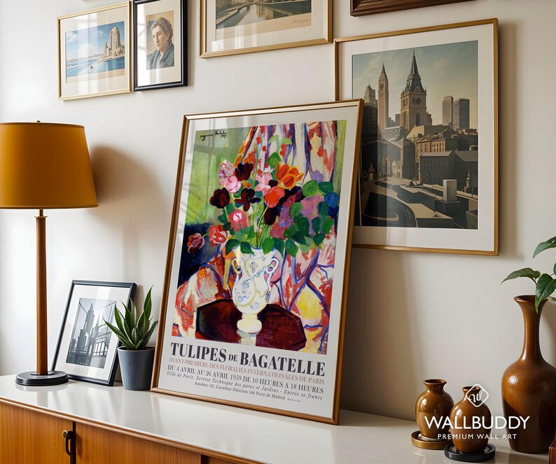 May include: A framed art print titled TULIPES DE BAGATELLE featuring a colorful floral arrangement in a white vase. The poster includes text detailing the 1939 Paris floral exhibition dates and times, set against a vibrant, abstract background.
