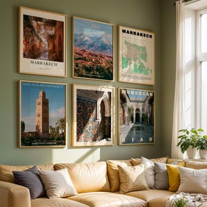 May include: A gallery wall set of six framed posters featuring Moroccan themes. The prints display the Marrakech medina, Atlas Mountains, a city map, Koutoubia Mosque, intricate tile work, and a courtyard riad, all housed in light wood frames.