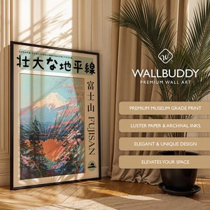May include: A framed wall art print featuring a stylised illustration of Mount Fuji with a lake and pine trees in the foreground. The print includes Japanese text at the top and the words "FUJISAN" vertically on the right side in a black frame.