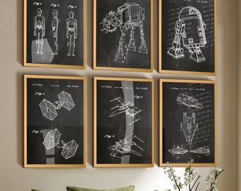 May include: A set of six framed wall art prints featuring white technical patent drawings of science fiction vehicles and characters on a black background, including U.S. Patent text and figure labels for each distinct mechanical design.