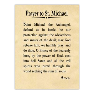 May include: A rectangular parchment-style print featuring the Prayer to St. Michael in black serif font. The text begins with the title Prayer to St. Michael, followed by the full prayer text, and concludes with the word Amen, all on a light tan background.