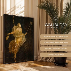 May include: A framed rectangular wall art print featuring a classical painting of a figure in flowing golden robes against a dark background. The print includes a vertical gold crack effect. Text on the image reads WALLBUDDY PREMIUM WALL ART.