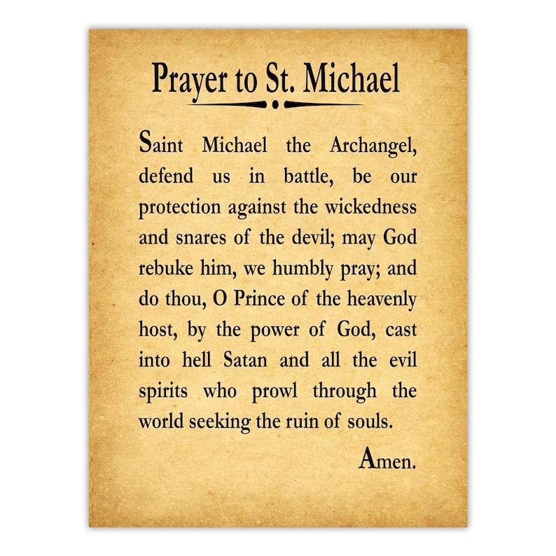 May include: A rectangular print on aged, tan-colored paper featuring the Prayer to St. Michael in black serif font. The text begins with the title Prayer to St. Michael, followed by the full prayer text and ending with the word Amen.