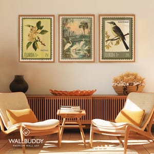 May include: Three framed vintage-style prints with Florida themes. The prints show a flower, the Everglades, and a bird. Each print has a postage stamp design with the word "FLORIDA" and a price of 25p.
