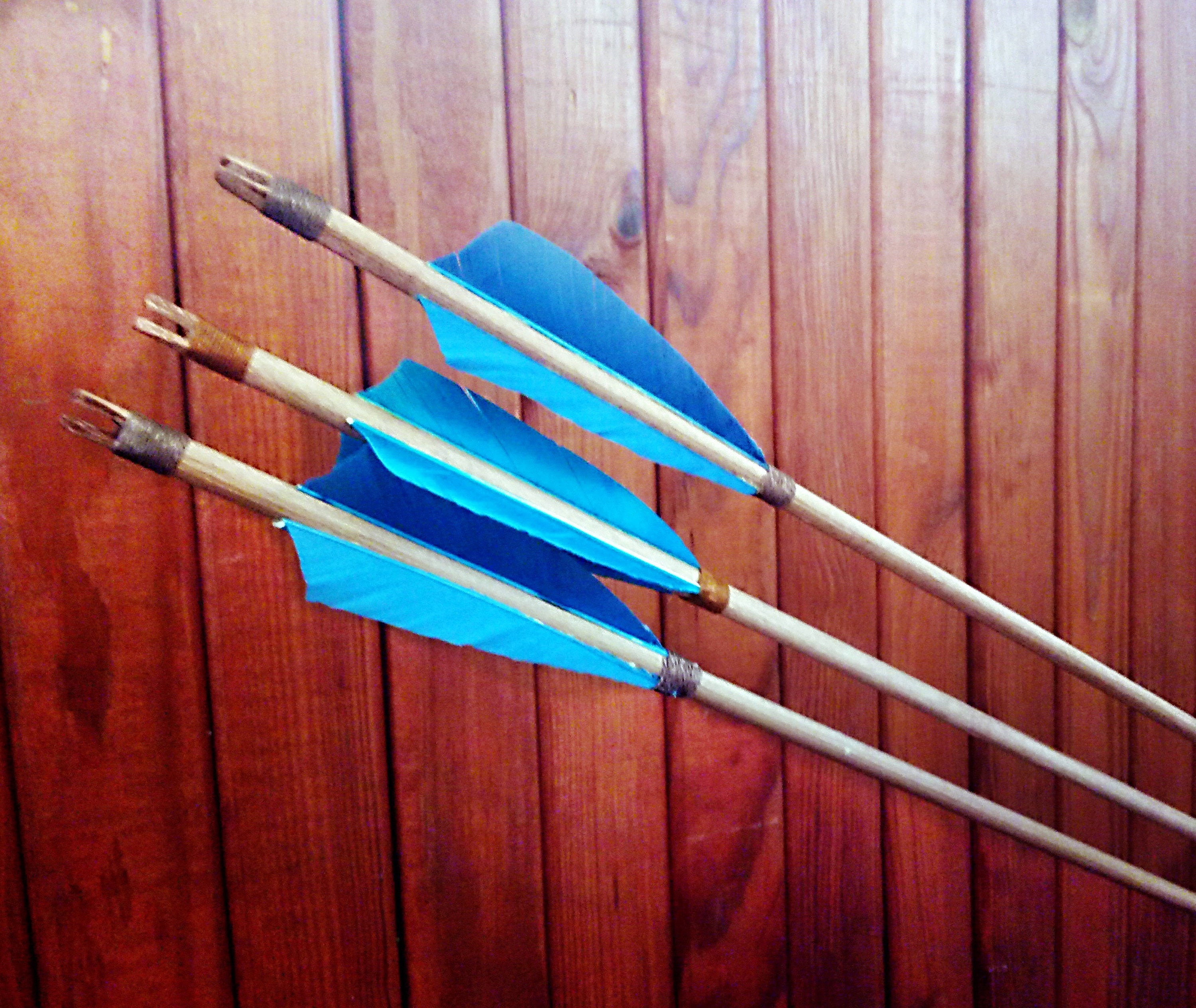 Order Blue wooden arrows for traditional and medieval archery