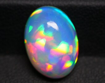 5,10 cts ovaler Regenbogen-Cabochon aus natürlichem äthiopischen Opal (10,5 x 15 mm) für Schmuck