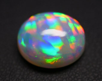 7.30 Cts Full in coloured Fire Natural Ethiopian Opal Oval Cabochon( 12.5x14.5 MM) for jewellery