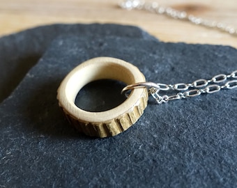 Nature necklace with wooden pendant, carved ring with crenellated bark on fine chain