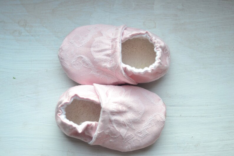 light pink baby shoes