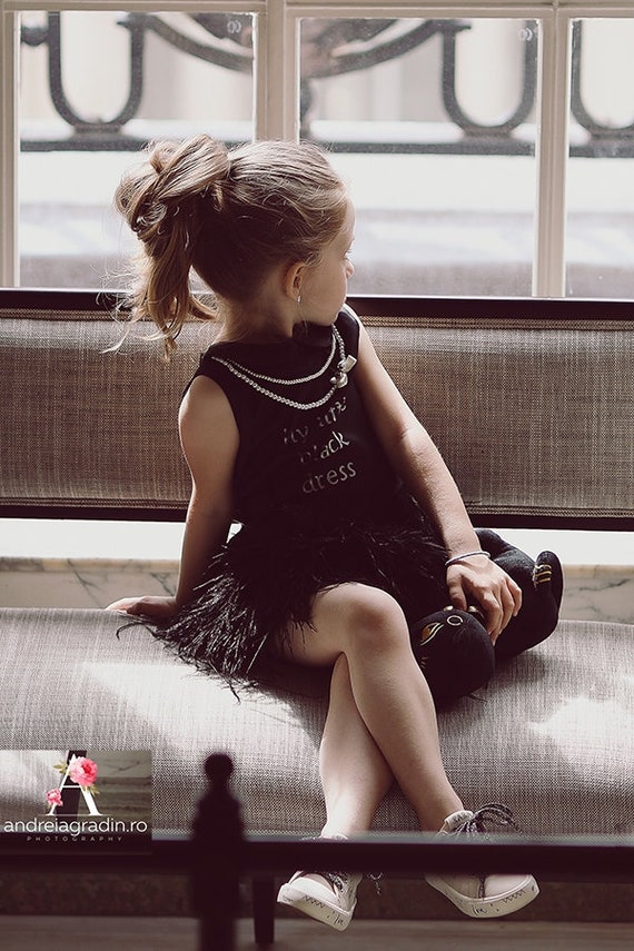 little black dress with feathers