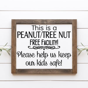 This is a Peanut Tree Nut Free Facility Sign, Severe Allergy Sign, Framed Canvas Entryway Sign, Food Allergy