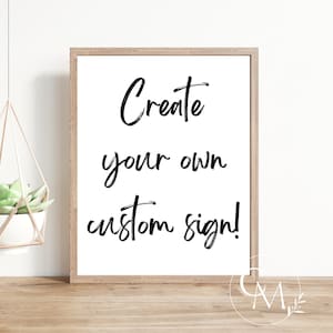 May include: A white framed print with black calligraphy that reads "Create your own custom sign!"