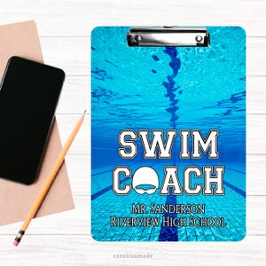 May include: A blue and white clipboard with a swimming pool image. The text "Swim Coach" is in white letters with a black outline. The text "Mr. Sanderson Riverview High School" is below the main text.