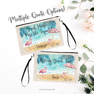 May include: Two canvas zipper pouches with beach-themed designs. One reads "Beach Please... Pass the Tequila!" with a flamingo, beach chair, and umbrella. The other says "Resting Beach Face." Both have black wrist straps.