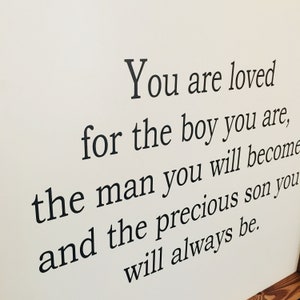 May include: Black and white text on a white background reads: "You are loved for the boy you are, the man you will become and the precious son you will always be."