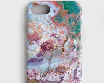 May include: A phone case with a colorful abstract design featuring swirls of pink, blue, green, and white. The design resembles a marble pattern.