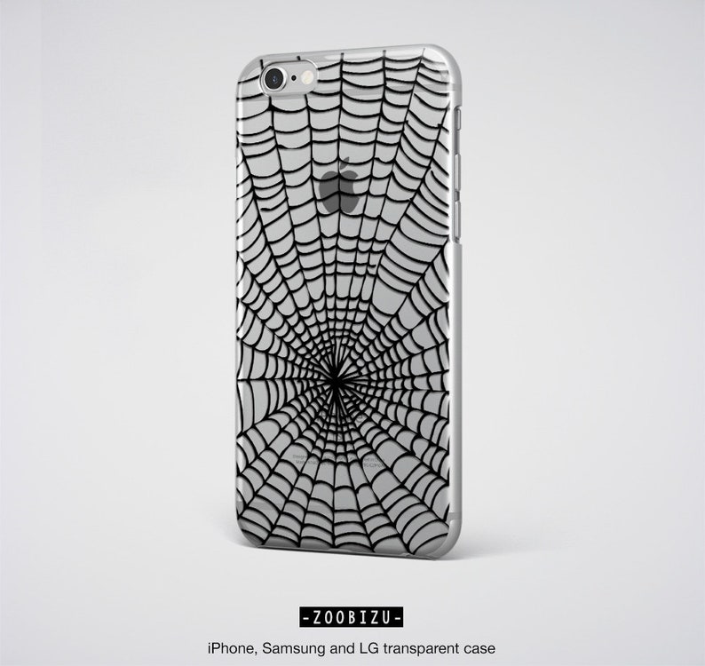 Peut inclure: Une coque de t&eacute;l&eacute;phone transparente avec un motif de toile d'araign&eacute;e noire. La coque est compatible avec les t&eacute;l&eacute;phones iPhone, Samsung et LG.