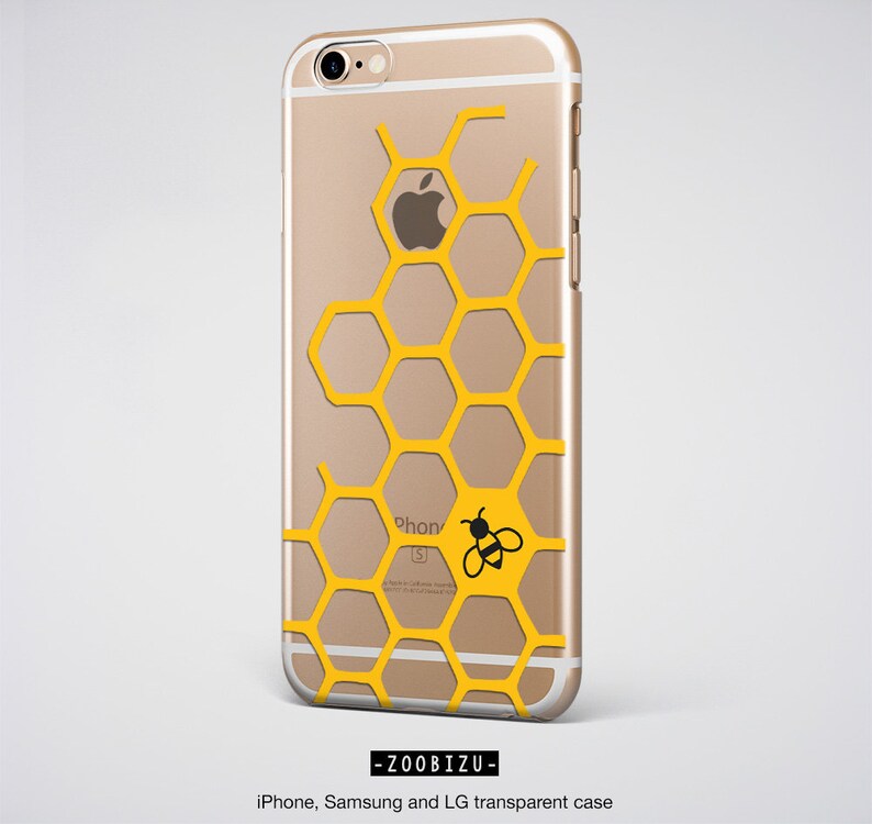 May include: A clear phone case with a honeycomb pattern in yellow and a small black bee graphic. The case is designed for iPhone, Samsung, and LG phones. The text "ZOO BIZU" is printed on the bottom of the case.