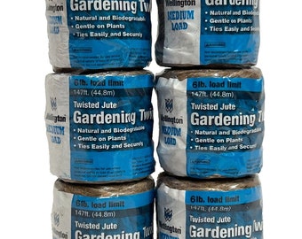 May include: Six spools of brown twisted jute gardening twine. Each spool is labeled "Wellington Medium Load" and has a 6 lb. load limit and 147 ft. (44.8 m) length. The twine is natural and biodegradable, gentle on plants, and ties easily and securely.