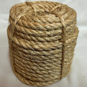 May include: A rustic wooden sign with the text "Welcome to our home" in white lettering. The sign features a distressed finish and a simple, inviting design, perfect for a front porch or entryway.