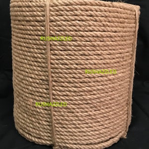 May include: A large roll of natural brown sisal rope. The rope is tightly wound and is ready to be used for a variety of projects.