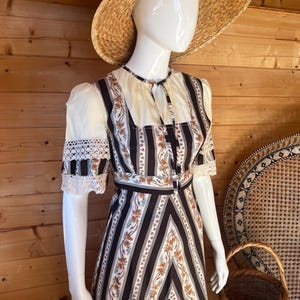 Vintage 1970’s black floral crochet maxi dress