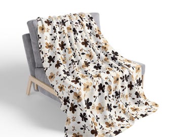 Manta de lã sherpa com estampa floral neutra | Manta floral bege e marrom