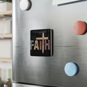 May include: A square black magnet featuring the word FAITH in large tan letters. A tan cross forms the letter T. Each letter contains small text referencing Bible verses including Romans 10:17, James 2:17, Psalm 37:5, Proverbs 3:5-6, John 3:16, Matthew 21:22, and Hebrews 11:1.