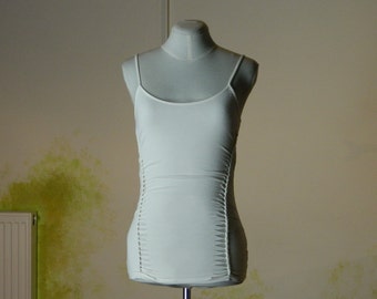 Ivory white top with braided details