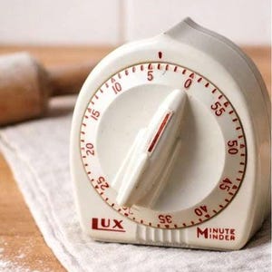 May include: A rustic wooden sign with the text "Welcome to our home" in white lettering. The sign features a distressed finish and a simple, inviting design, perfect for entryway decor.