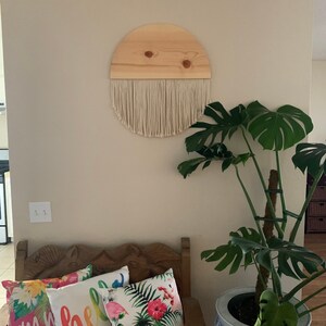 Decorative pine and macramé wall decor
