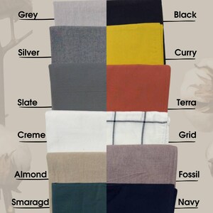 May include: A color chart with 10 fabric swatches. The swatches are arranged in two columns of five. The swatches are labeled with the following names: Grey, Silver, Slate, Creme, Almond, Black, Curry, Terra, Grid, Fossil, Smaragd, Navy.